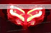 Противотуманные фонари красного цвета в задний бампер Toyota Land Cruiser 200