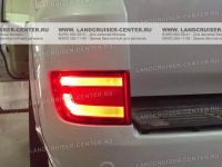 Противотуманные фонари красного цвета в задний бампер Toyota Land Cruiser 200
